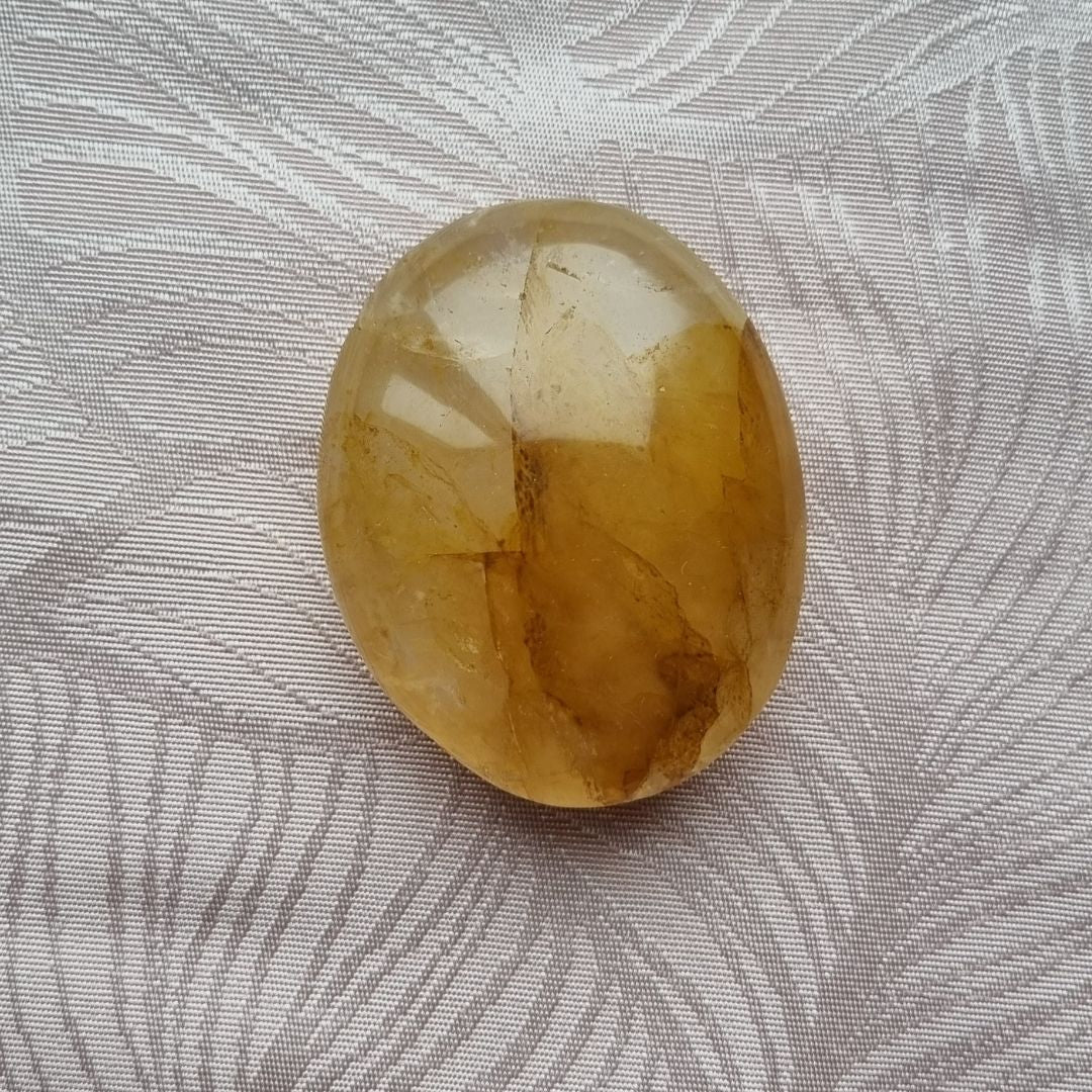 Golden healer handsteen